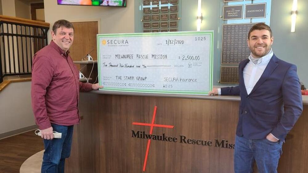The Starr Group and SECURA Insurance delievered a donation check to Milwaukee Rescue Mission.