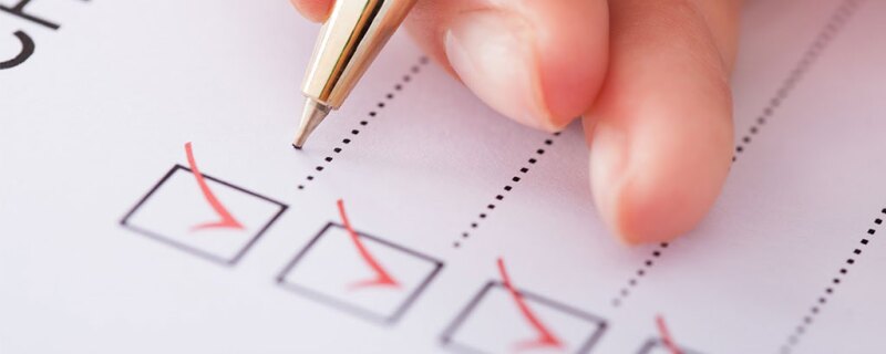 Someone checking off their checklist