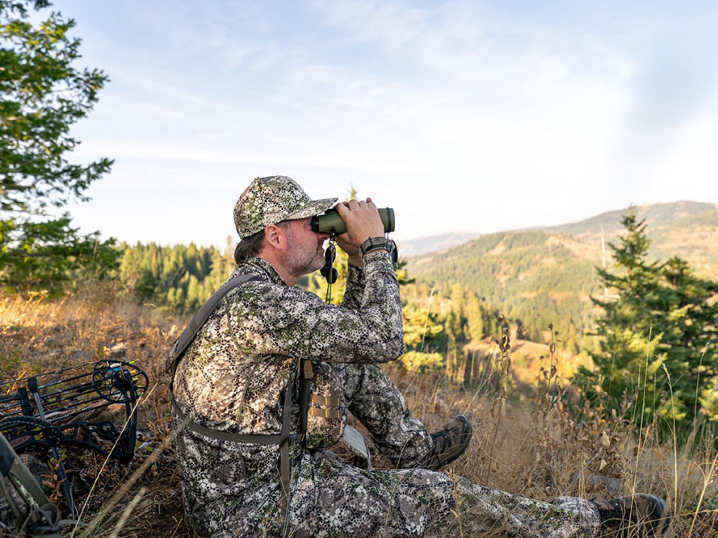 hunting guide glassing the hills