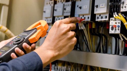 Someone testing electrical work.