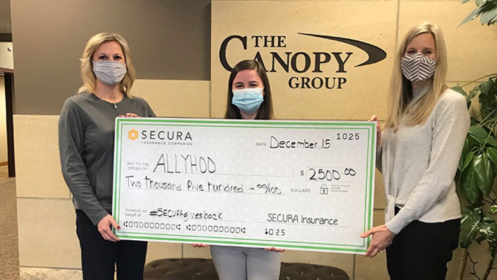the-canopy-group and SECURA Insurance deliver check to Allyhoo.