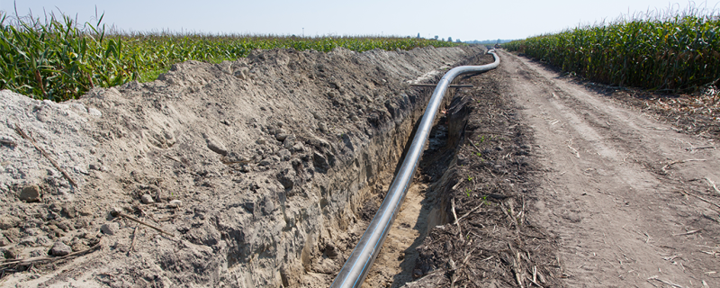 Underground piping in farm trench