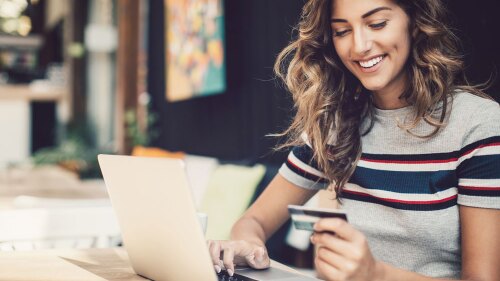A women making a payment.