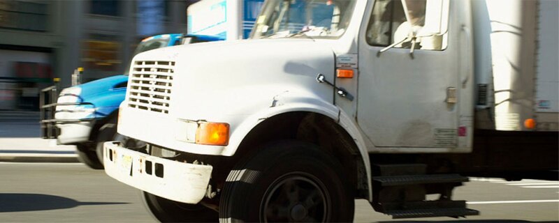 Truck driving on a road.