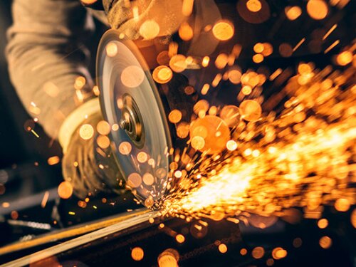 Someone using a hand tool.