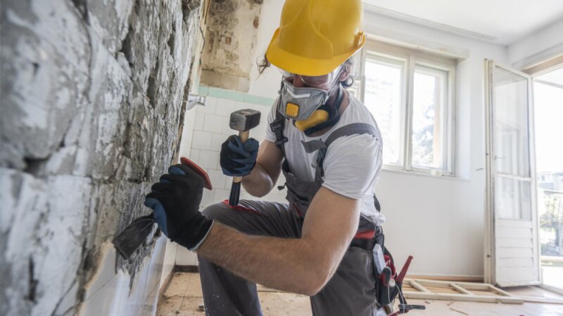 construction worker using hand tools