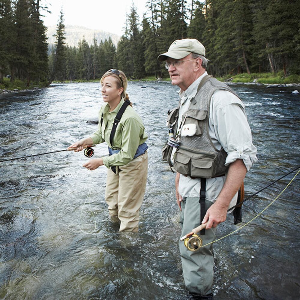 fly-fishing-guide-with-client-on-river.jpg