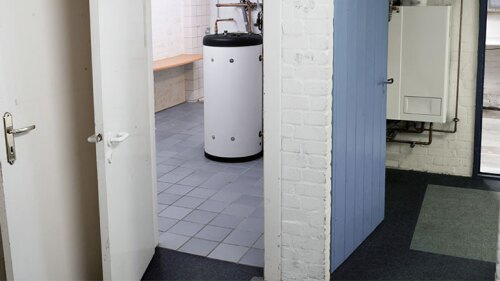 Basement with a water heater.